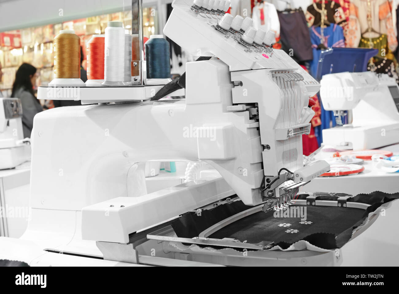 Modern embroidery machine at shop Stock Photo - Alamy