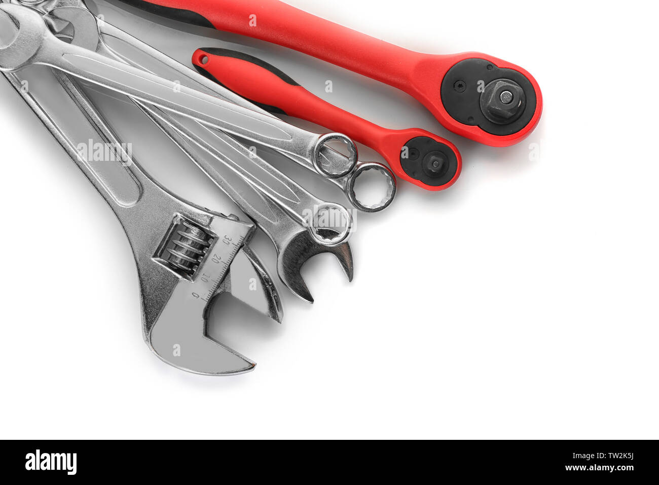 Combination and screw wrenches with ratchets on white background Stock