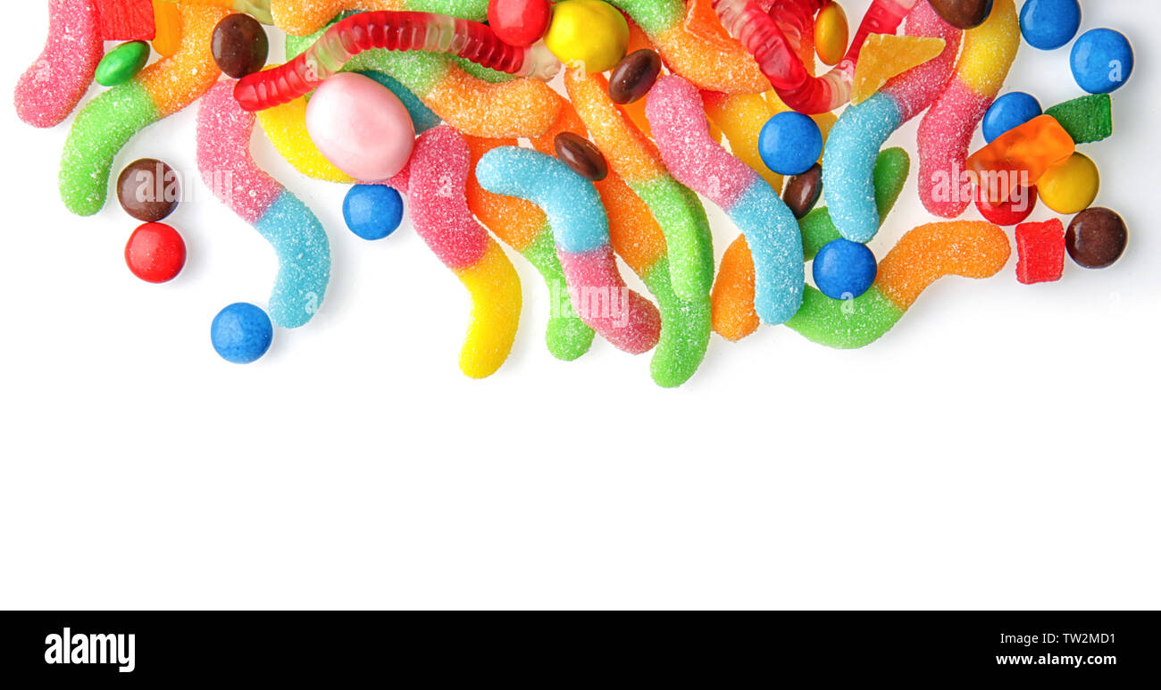 Colorful candies on white background Stock Photo - Alamy