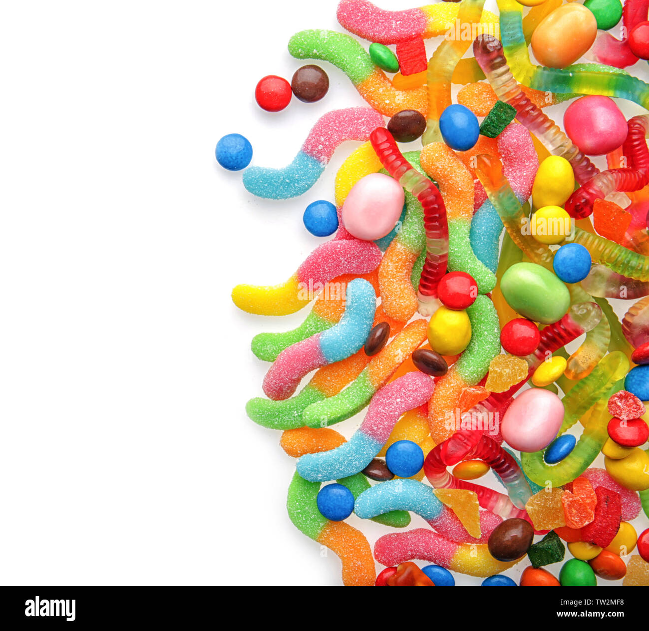 Colorful candies on white background Stock Photo - Alamy