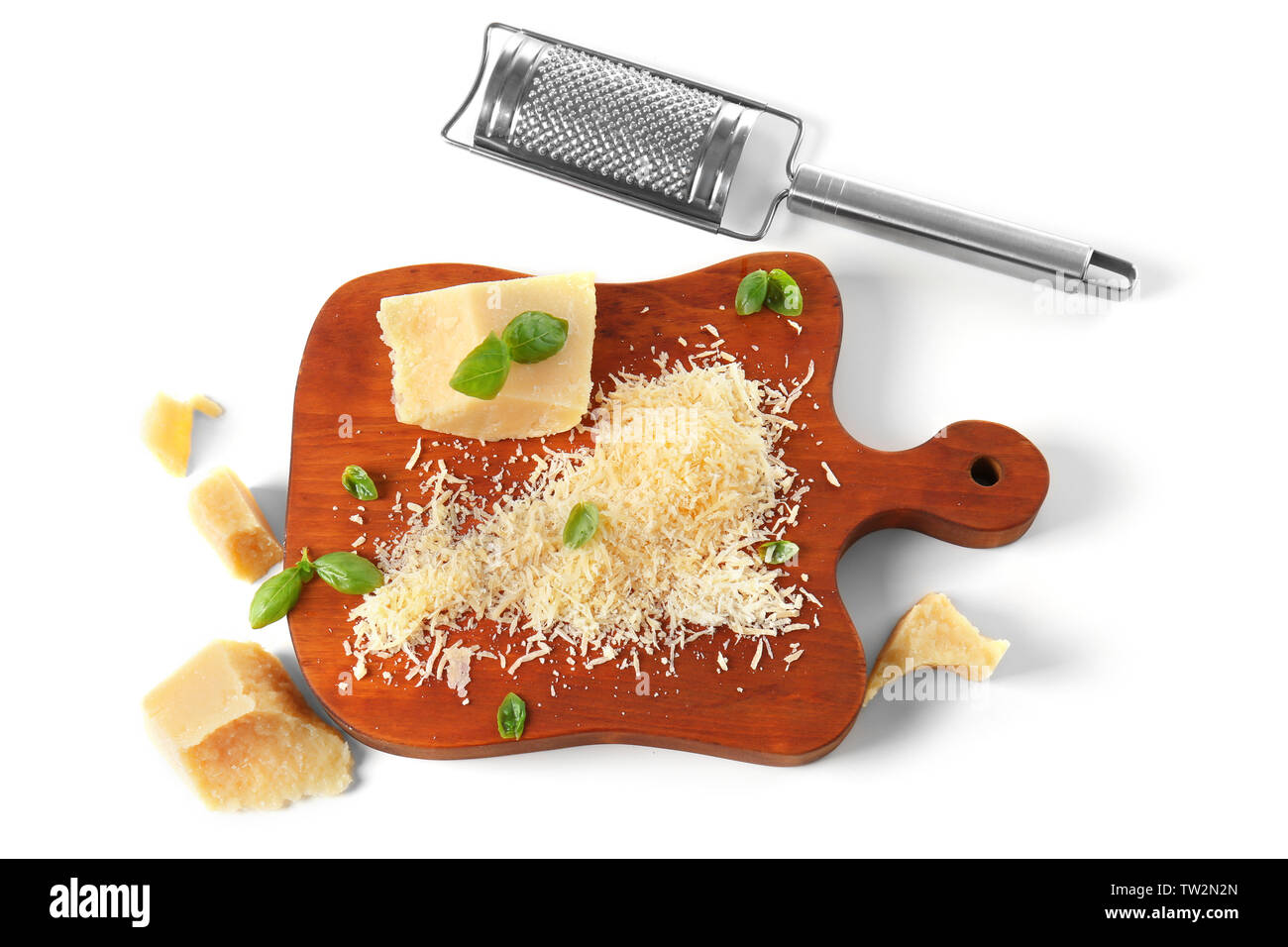 Parmesan cheese and metal grater on a kitchen board Stock Photo by ©fermate  80870816