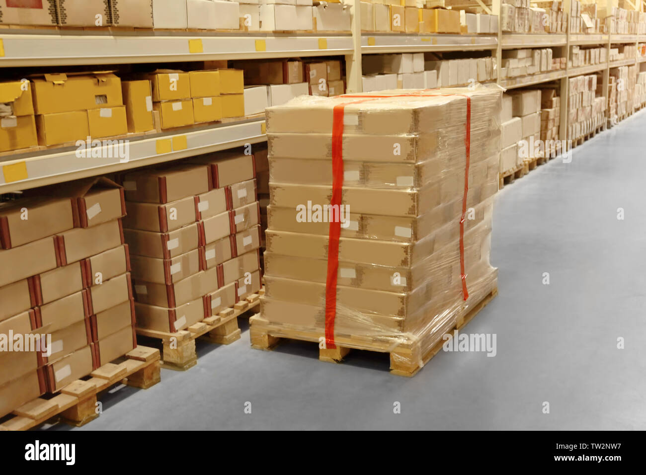 Boxes with goods in wholesale warehouse Stock Photo Alamy