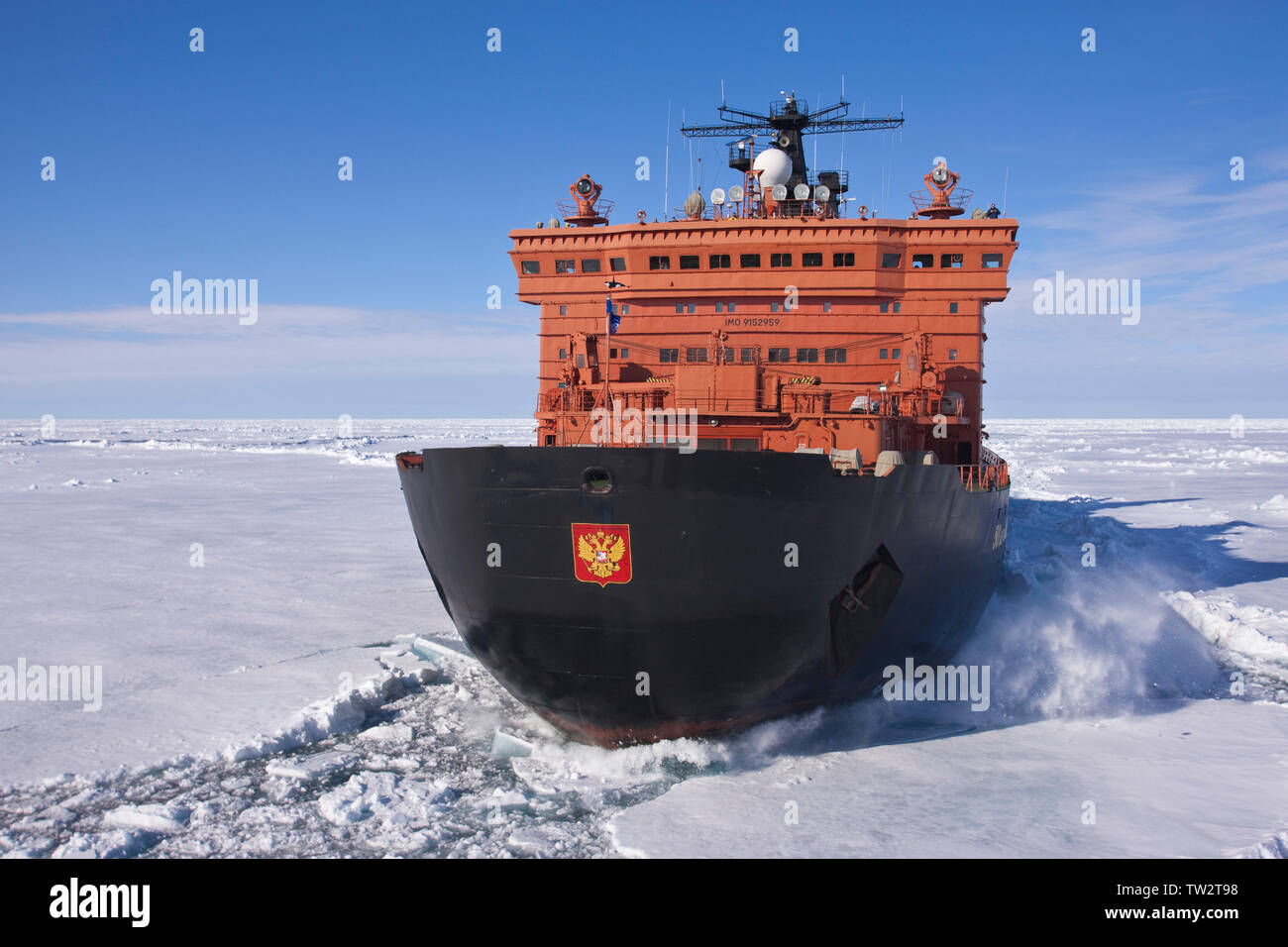 Aerial view of world's largest nuclear icebreaker, 50 years of Victory, an Arktika class vessel, en route to North Pole taking tourists to 90 degrees. Stock Photo