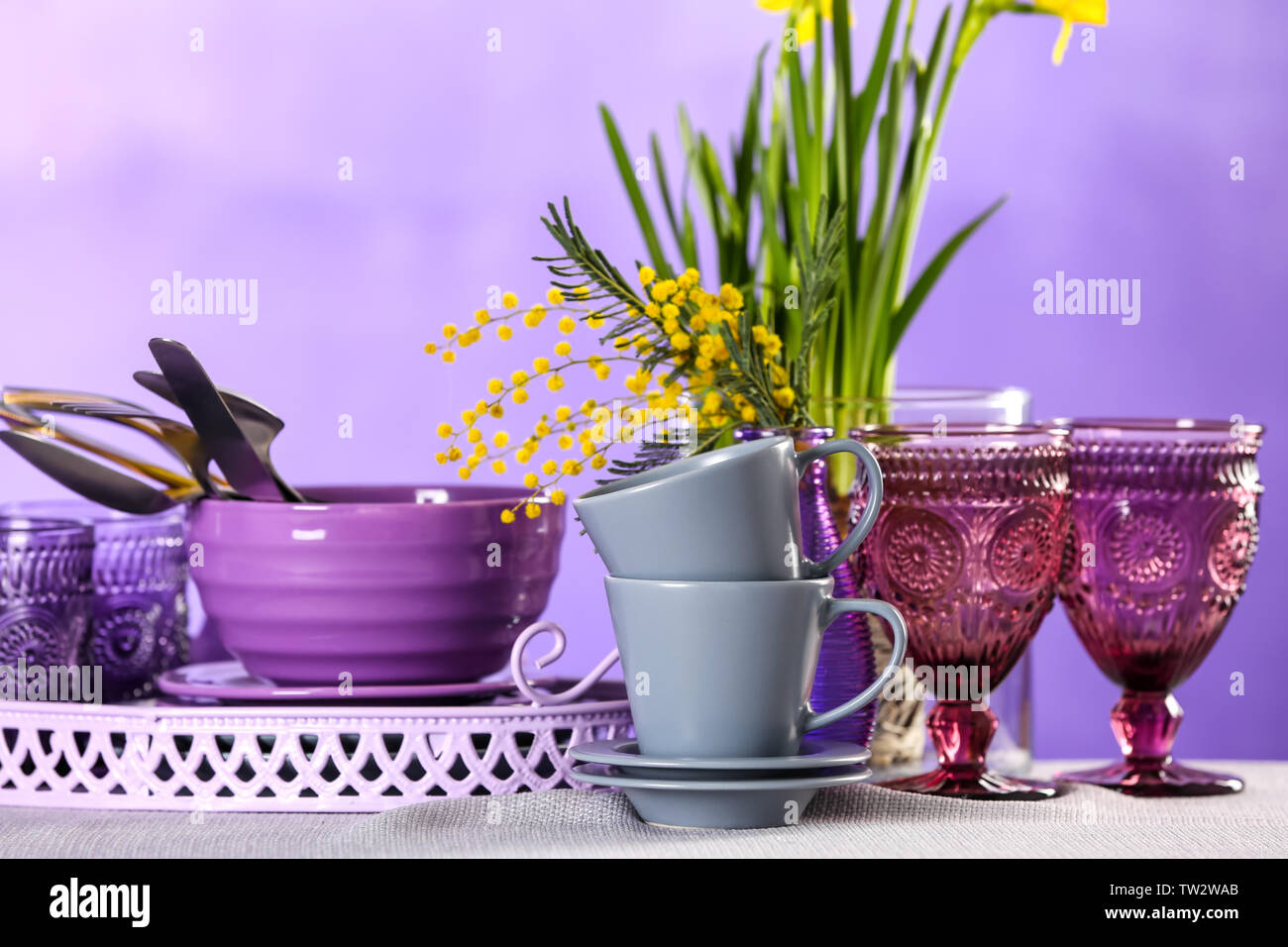 Set of dishware on table Stock Photo