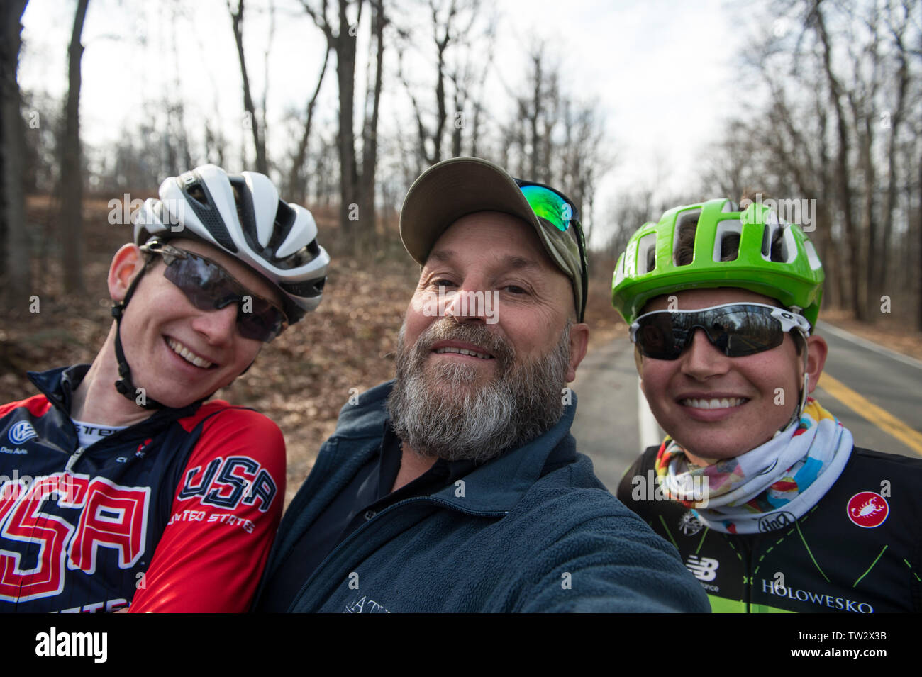 UNITED STATES - December 8, 2015: Pro cyclist Justin Mauch photographer Doug 'grizzly' Graham and Joe Dombrowski during a break in their ride across M Stock Photo