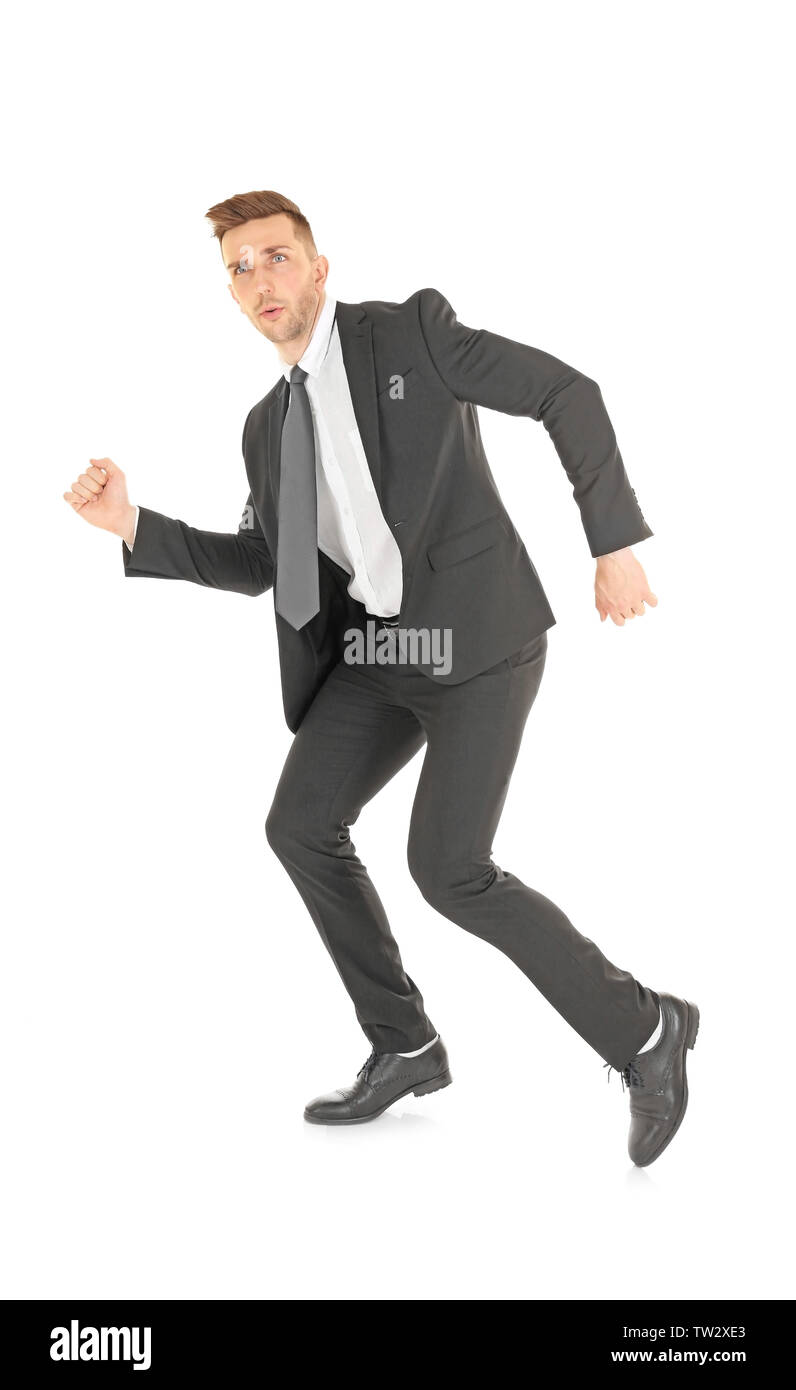 Handsome running businessman on white background Stock Photo - Alamy