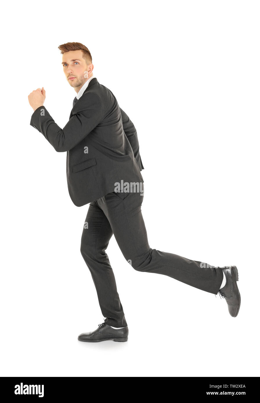 Handsome running businessman on white background Stock Photo - Alamy