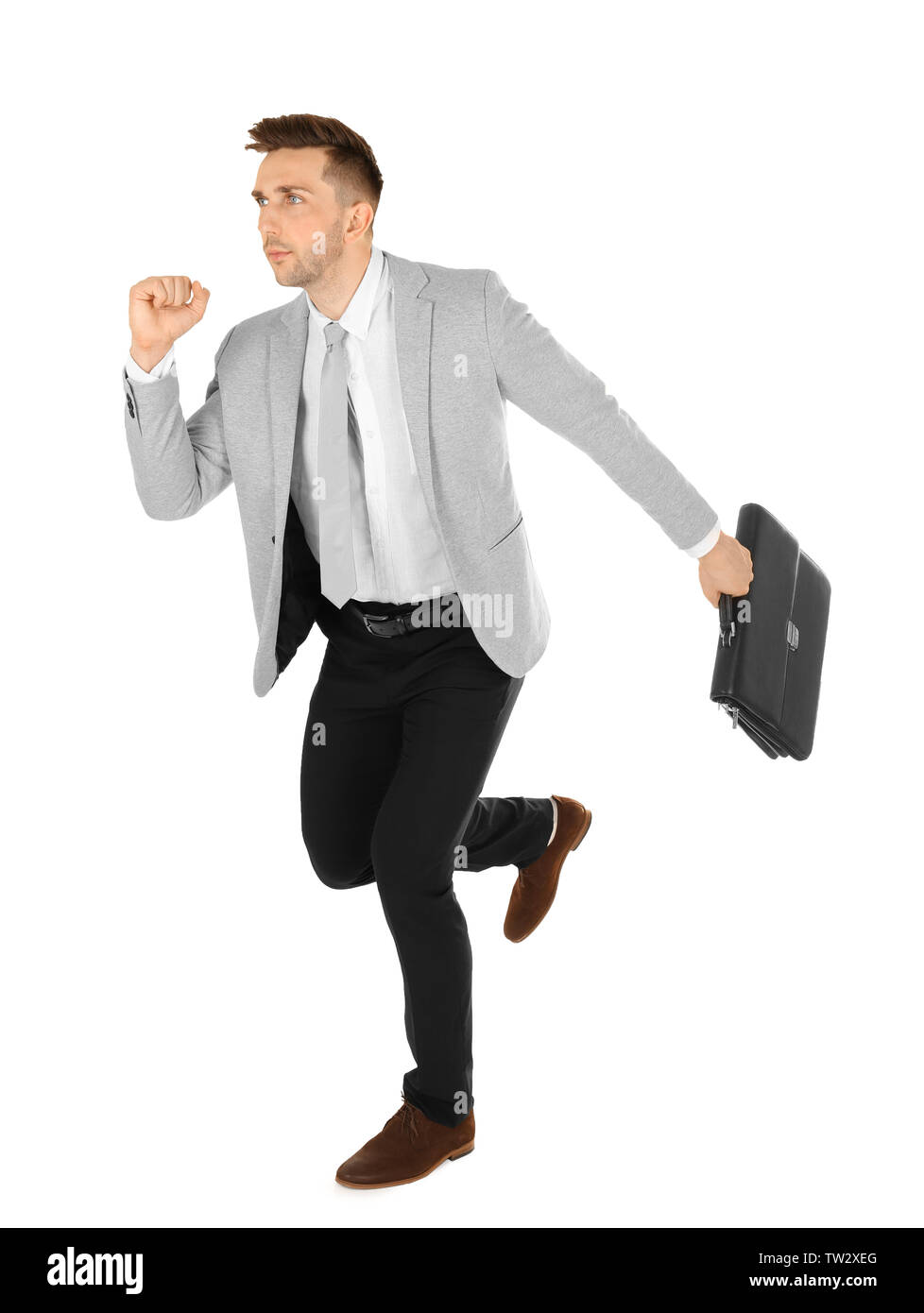 Handsome running businessman on white background Stock Photo - Alamy