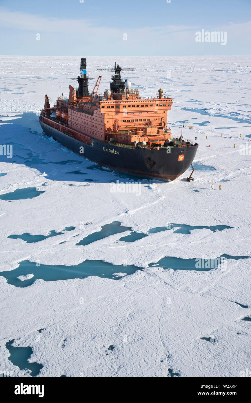 World's largest nuclear icebreaker, 50 Years of Victory, chartered by Quark Expeditions for trip to North Pole. Aerial view of ship in sea ice. Stock Photo