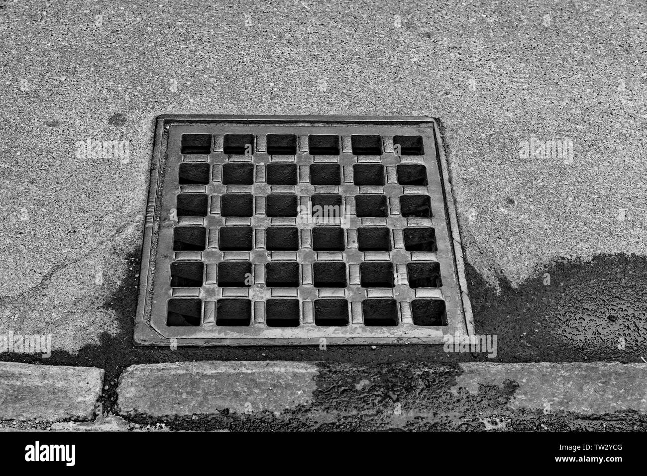 Old sewer grate-Old Montreal, Quebec, Canada Stock Photo