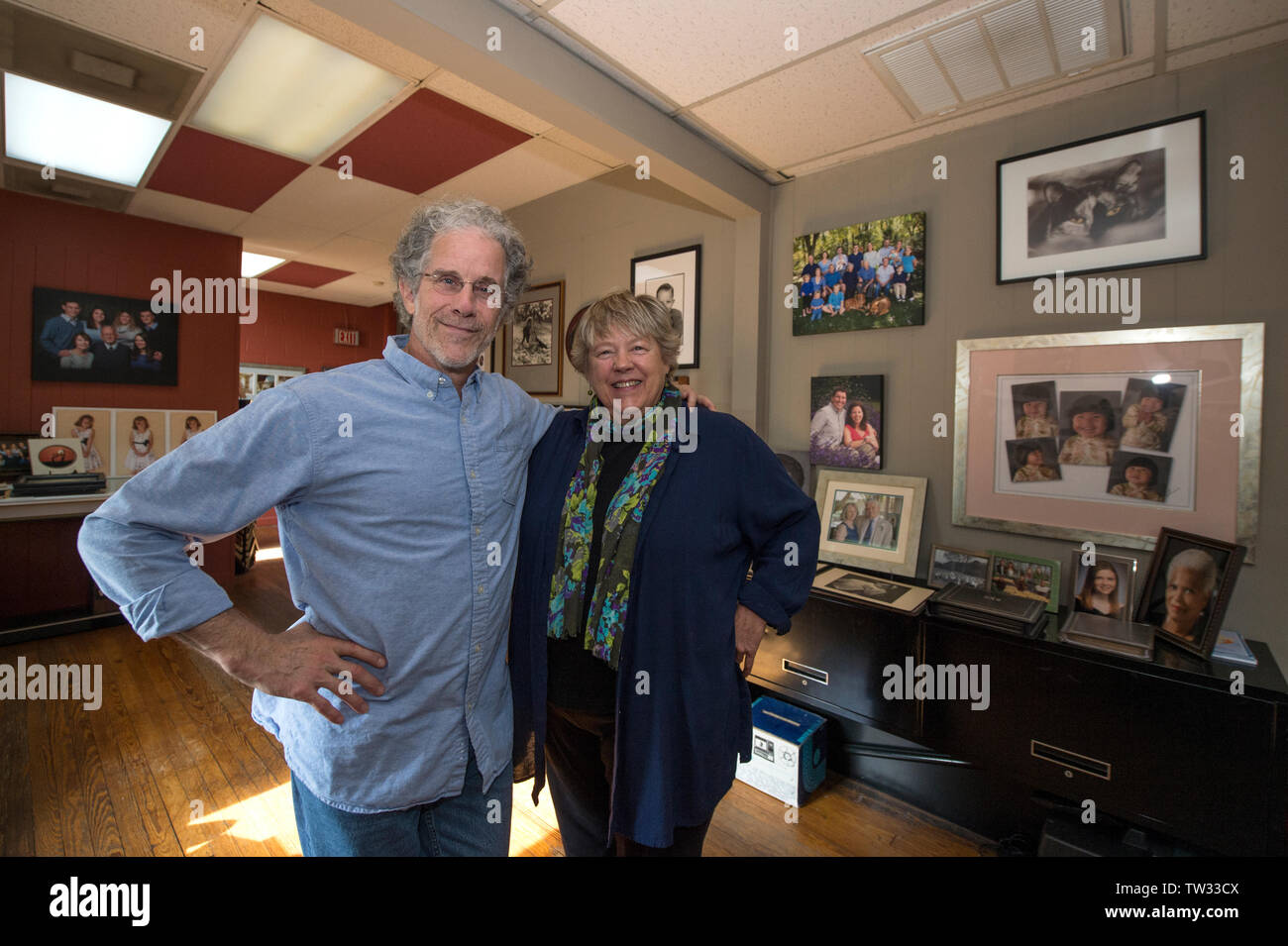 UNITED STATES - November 16. 2015: Neil Steinberg and K.D. Kidder of Photoworks pose for a photo in their studio in downtown Leesburg Virginia. The ph Stock Photo