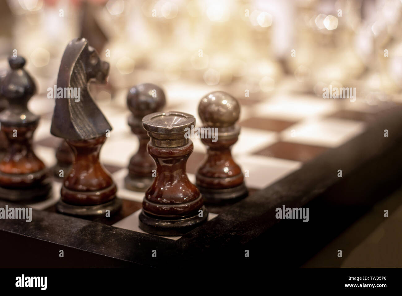 old classic wood chess game in strat position of game. Strategy sport game. Stock Photo