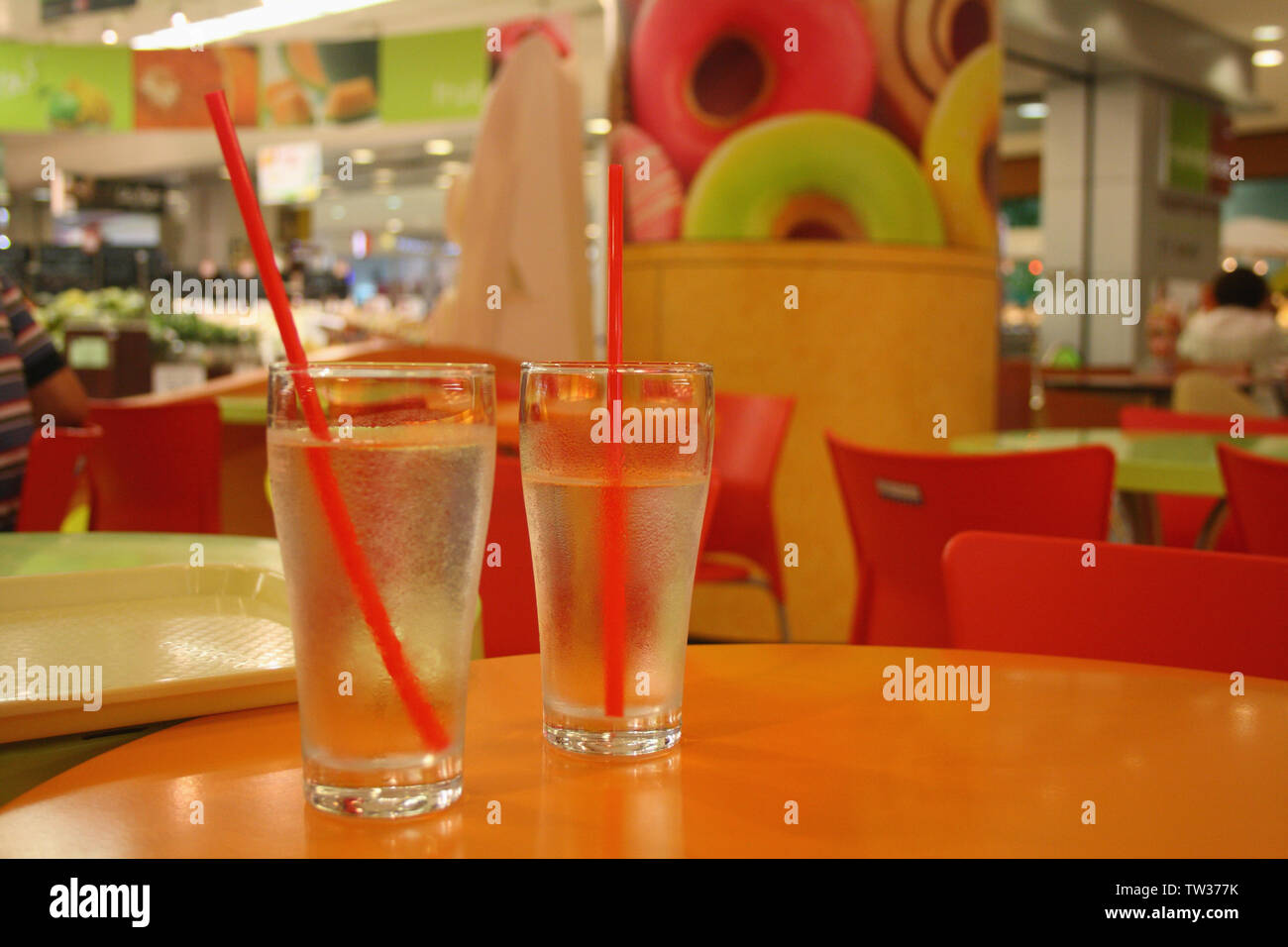 Two cold drink glasses on a table, Phuket, Thailand Stock Photo