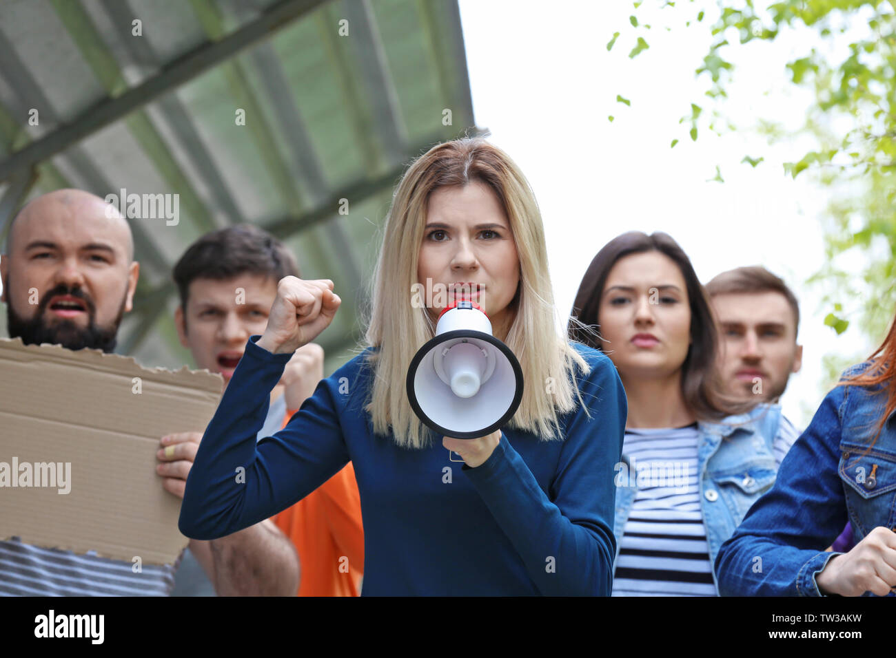 Group protesting young female hi-res stock photography and images - Alamy