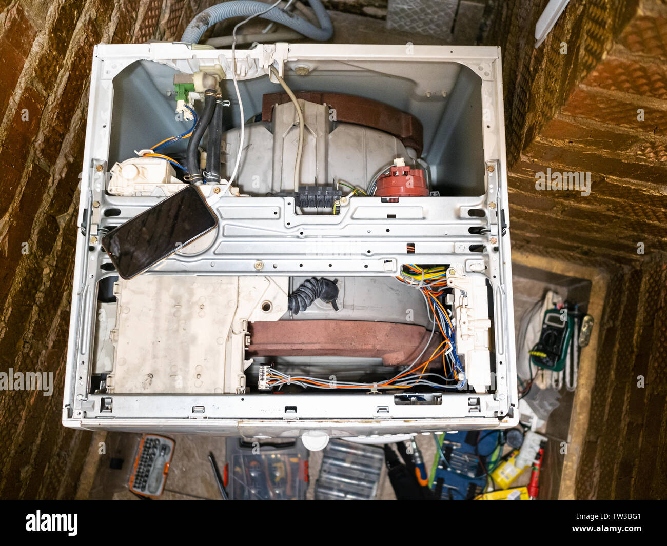 top view of repairing an old washing machine at home Stock Photo Alamy
