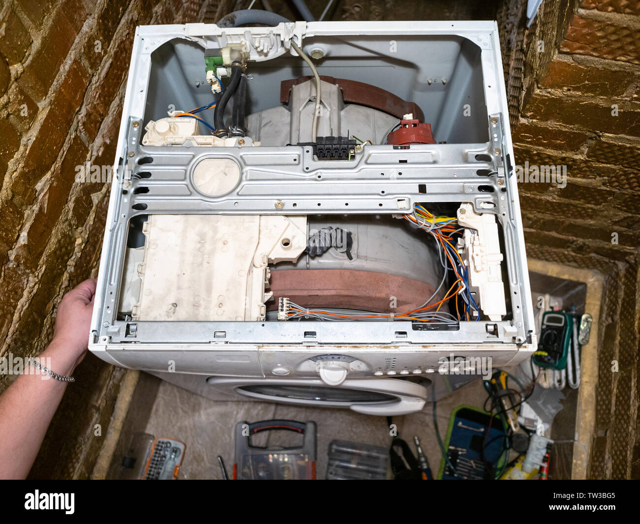 service maintenance of old washing machine at home Stock Photo Alamy