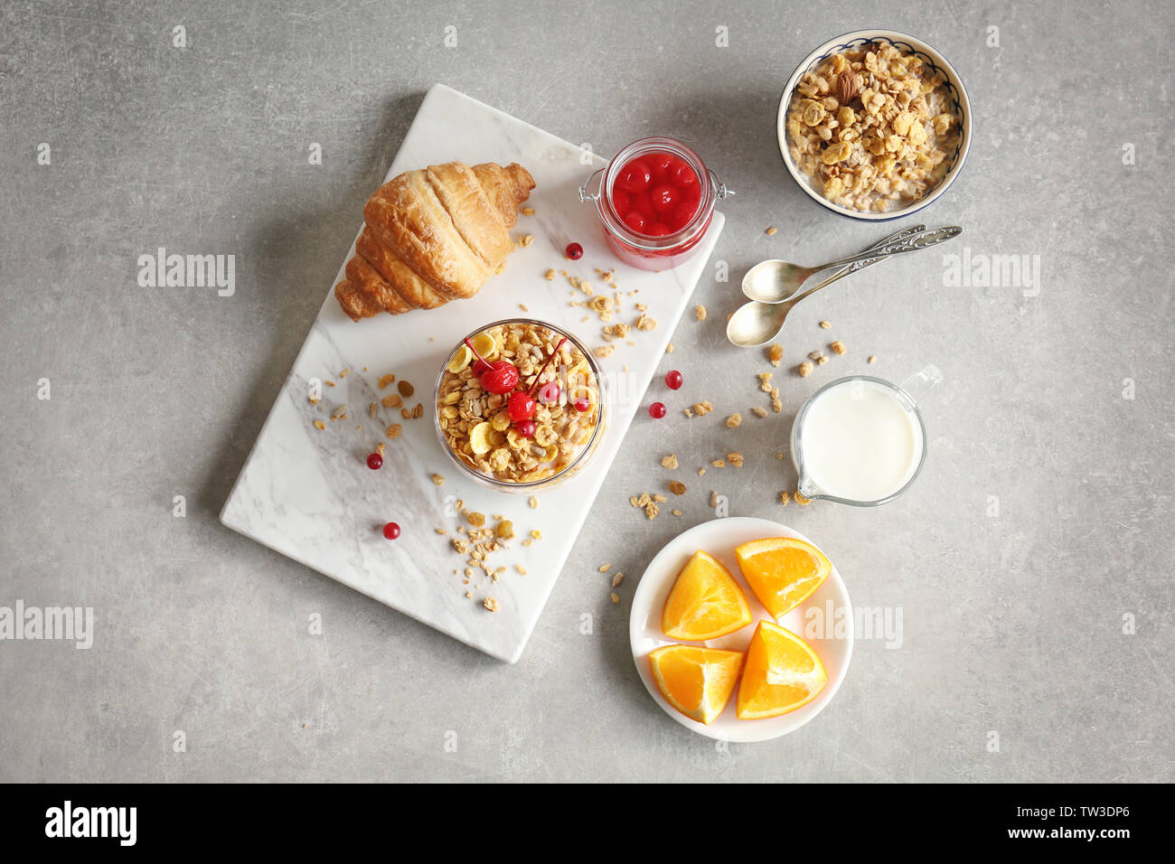 Healthy breakfast with muesli, berries and yogurt on table Stock Photo ... image.