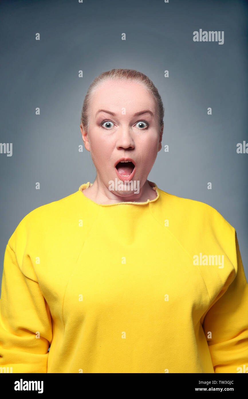 Mature blonde woman surprised expression hi-res stock photography and ...