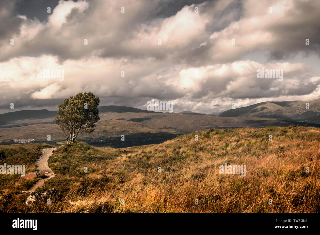 Dramatic sky over characteristic Scottish highland landscape Stock Photo