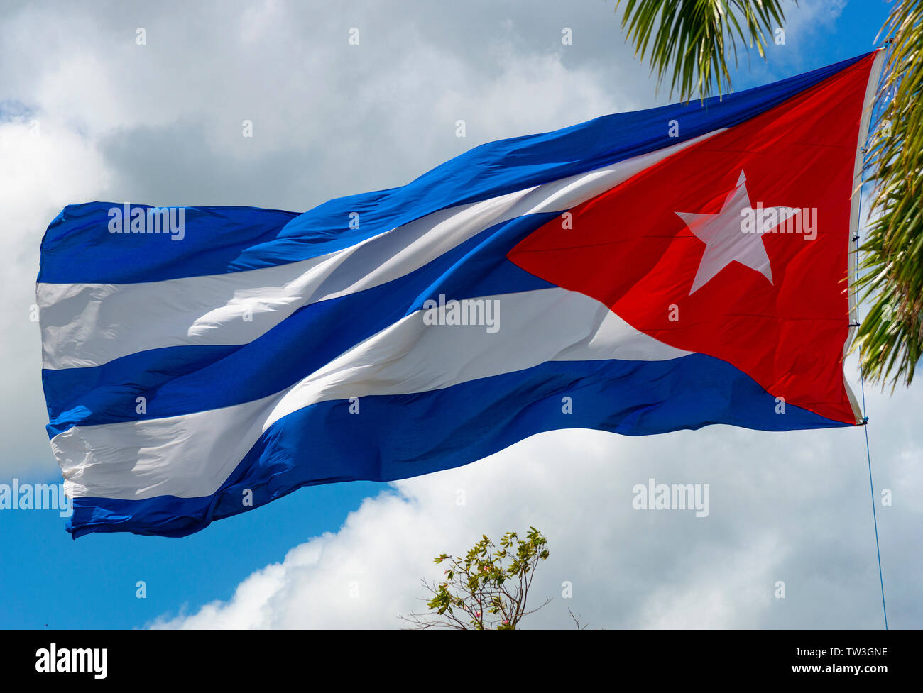 Flag flying alongside the  Ernesto Che Guevara monument at Santa Clara, the city of the heroic guerrilla, Cuba, Caribbean Stock Photo