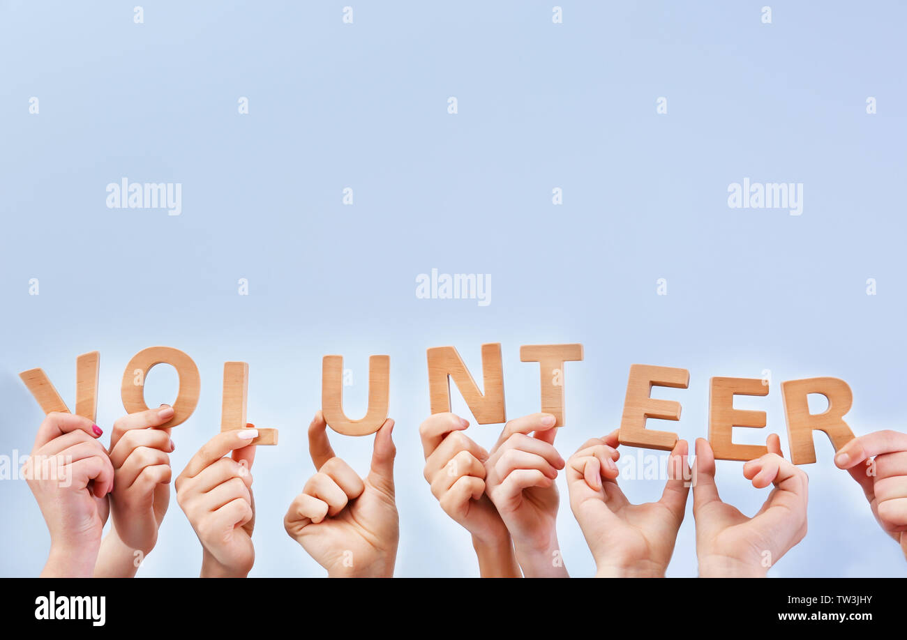Word hands team people letters hi-res stock photography and images - Alamy