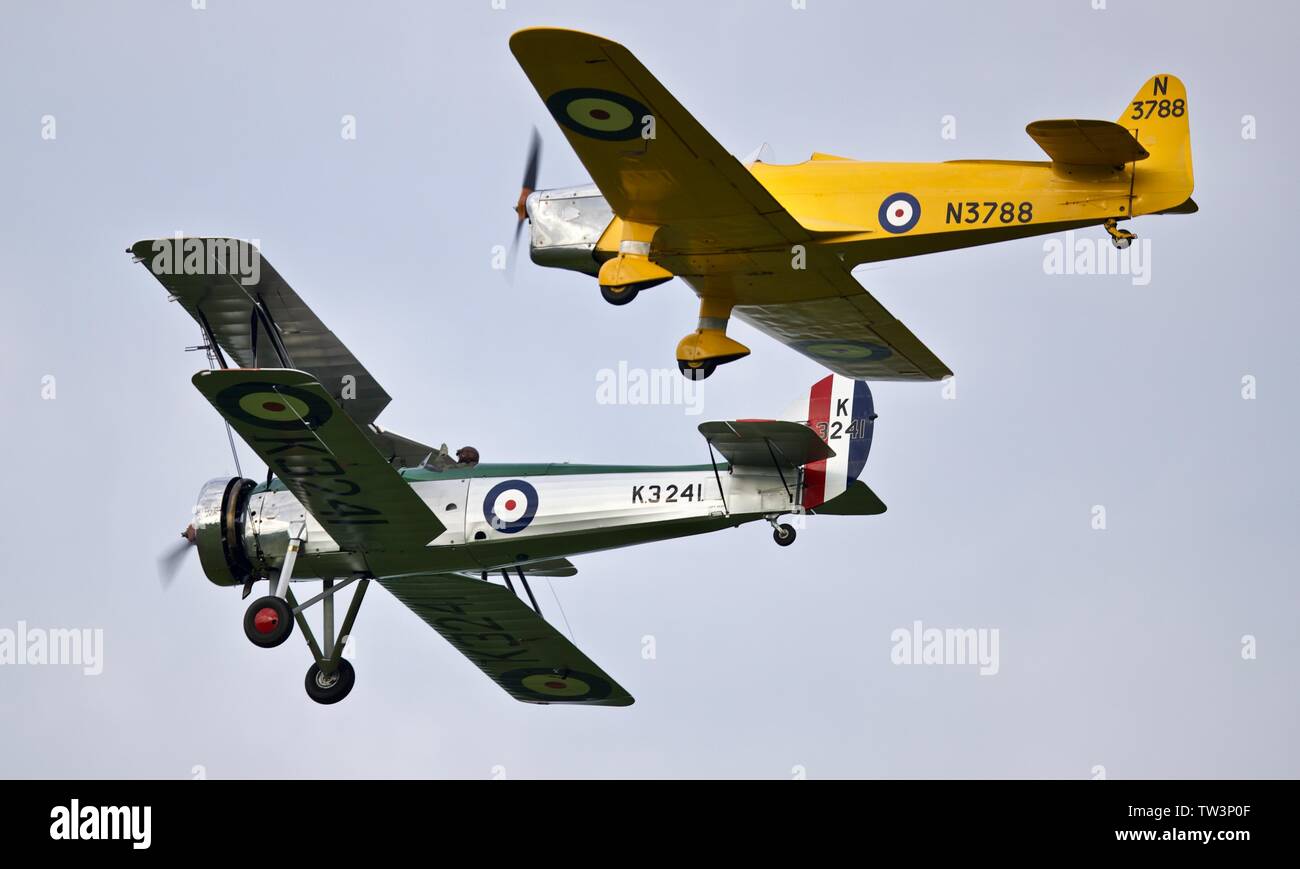 Avro 621 Tutor and the Miles Magister flying in formation at the Shuttleworth Evening Airshow on the 18th May 2019 Stock Photo