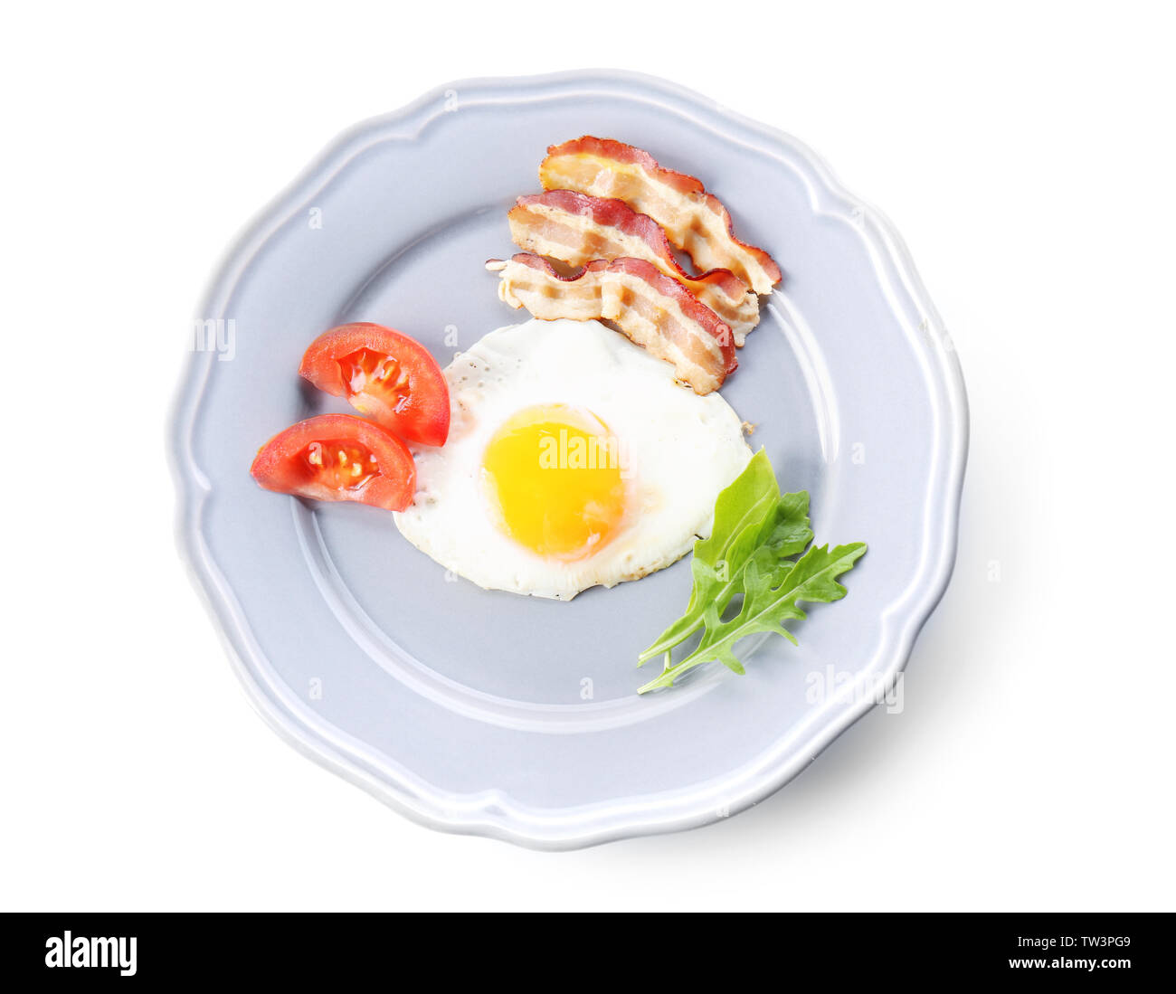 Plate with tasty egg for breakfast on white background Stock Photo - Alamy