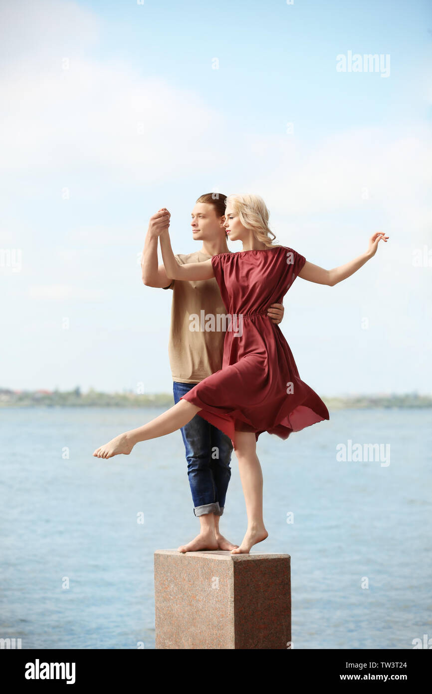 Passionate couple dancing outdoors Stock Photo - Alamy