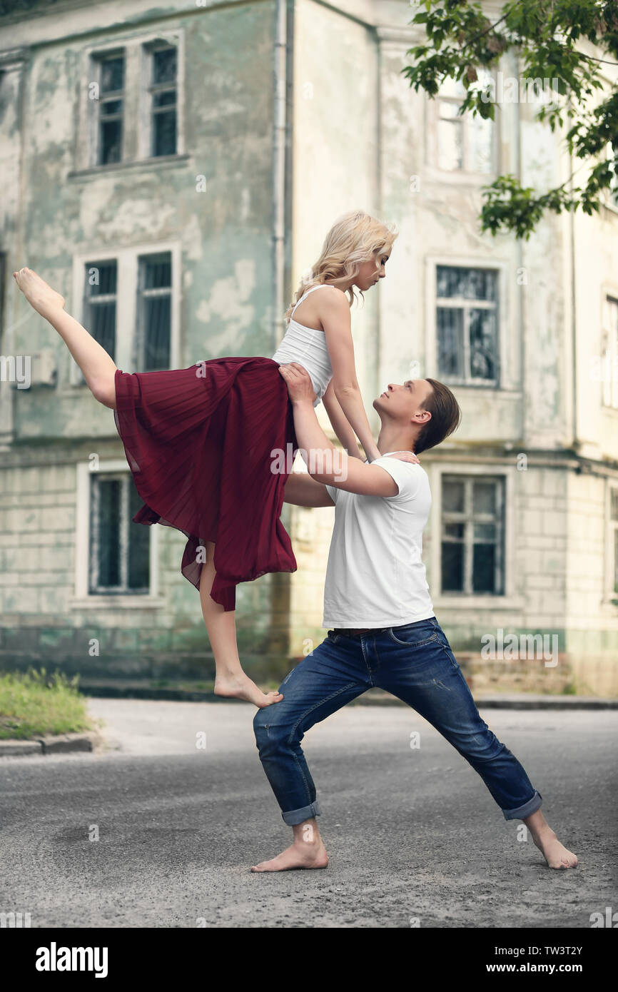 Passionate couple dancing outdoors Stock Photo - Alamy