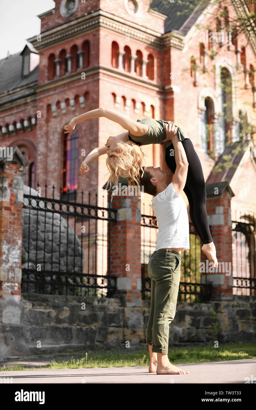 Passionate couple dancing outdoors Stock Photo