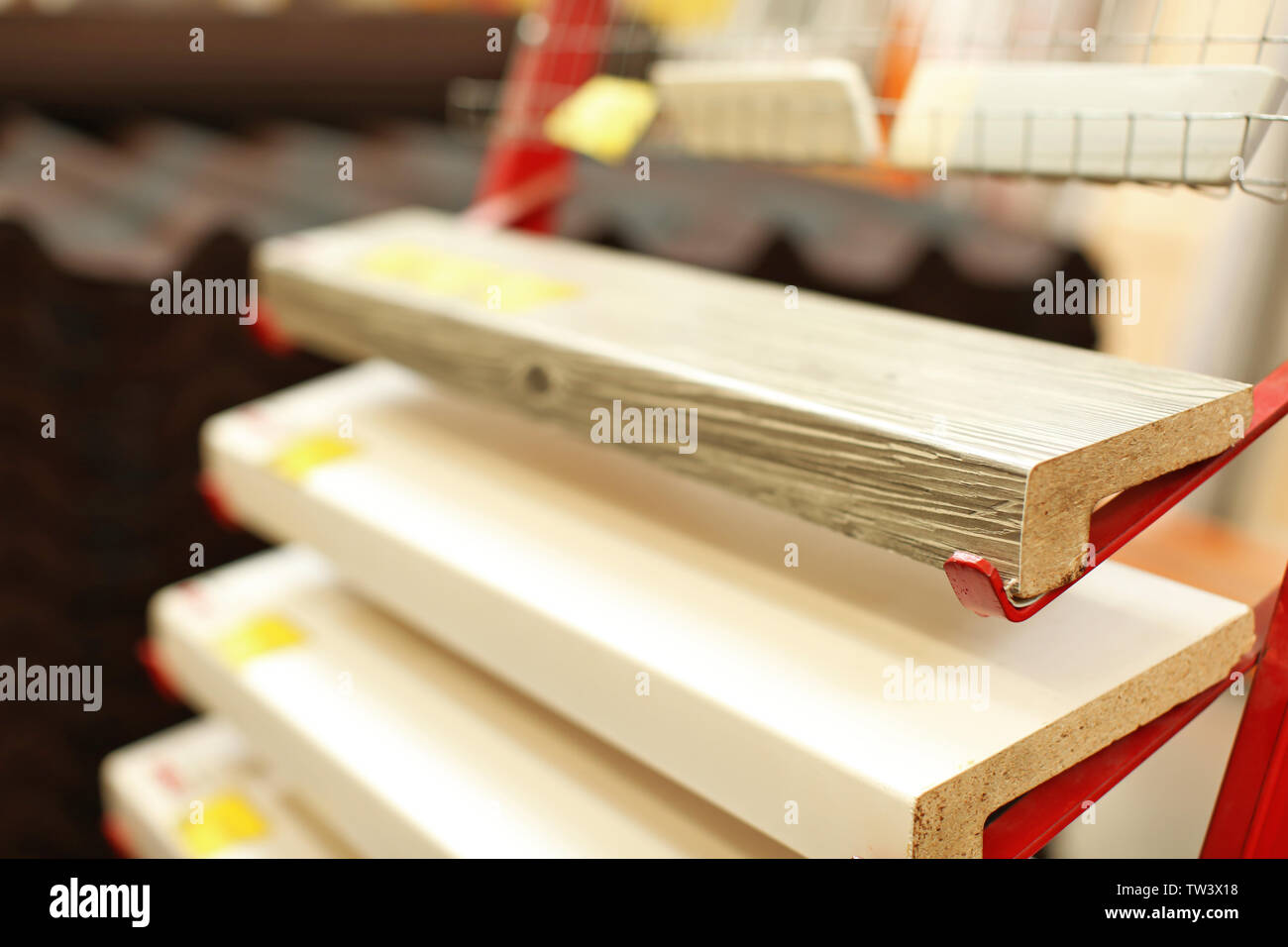 Different samples of wooden window sills on metal stand Stock Photo - Alamy