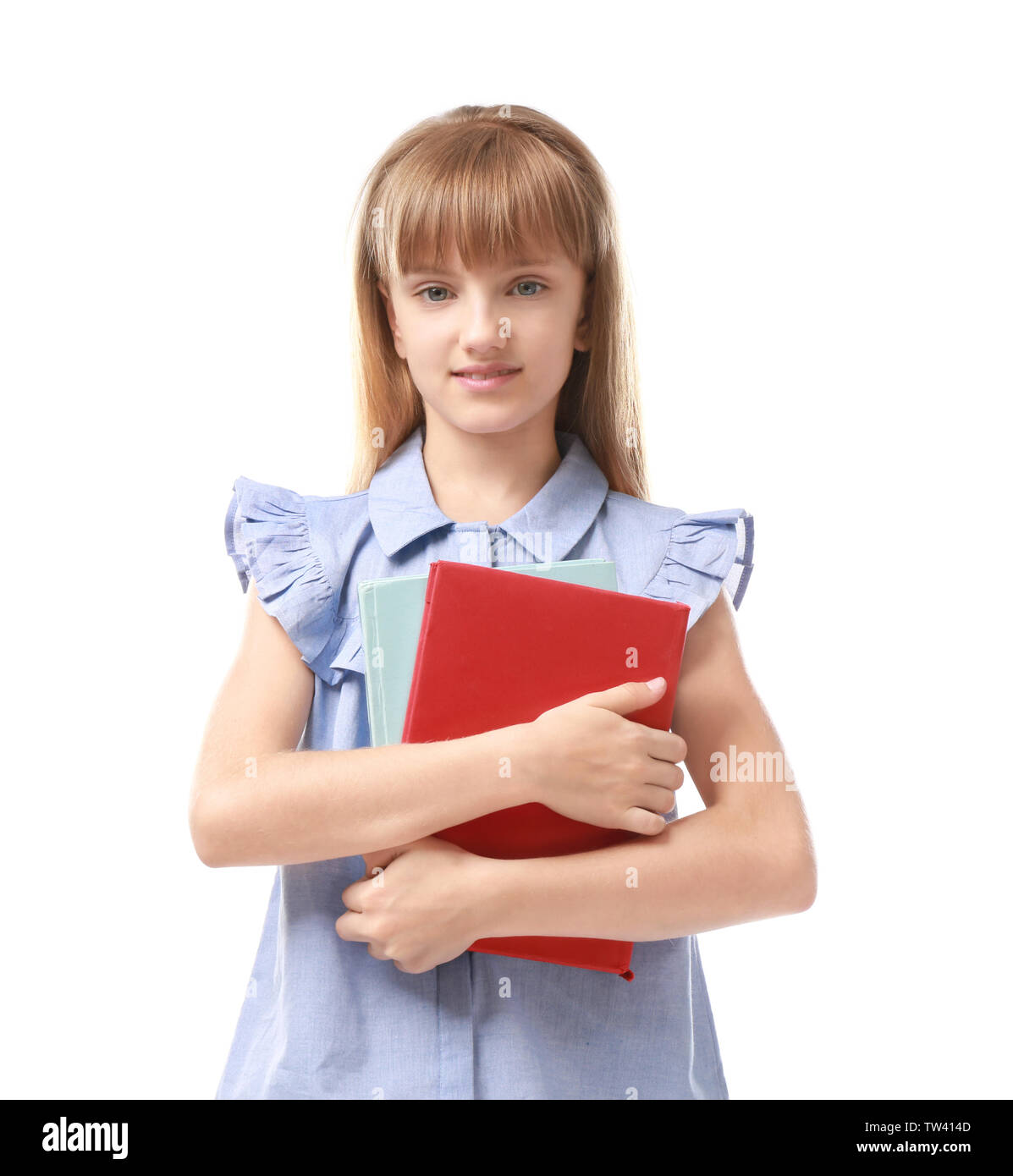 Pretty little girl with books on white background Stock Photo - Alamy
