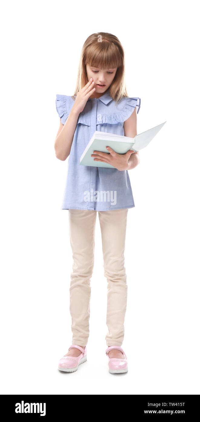 Pretty little girl with book on white background Stock Photo - Alamy