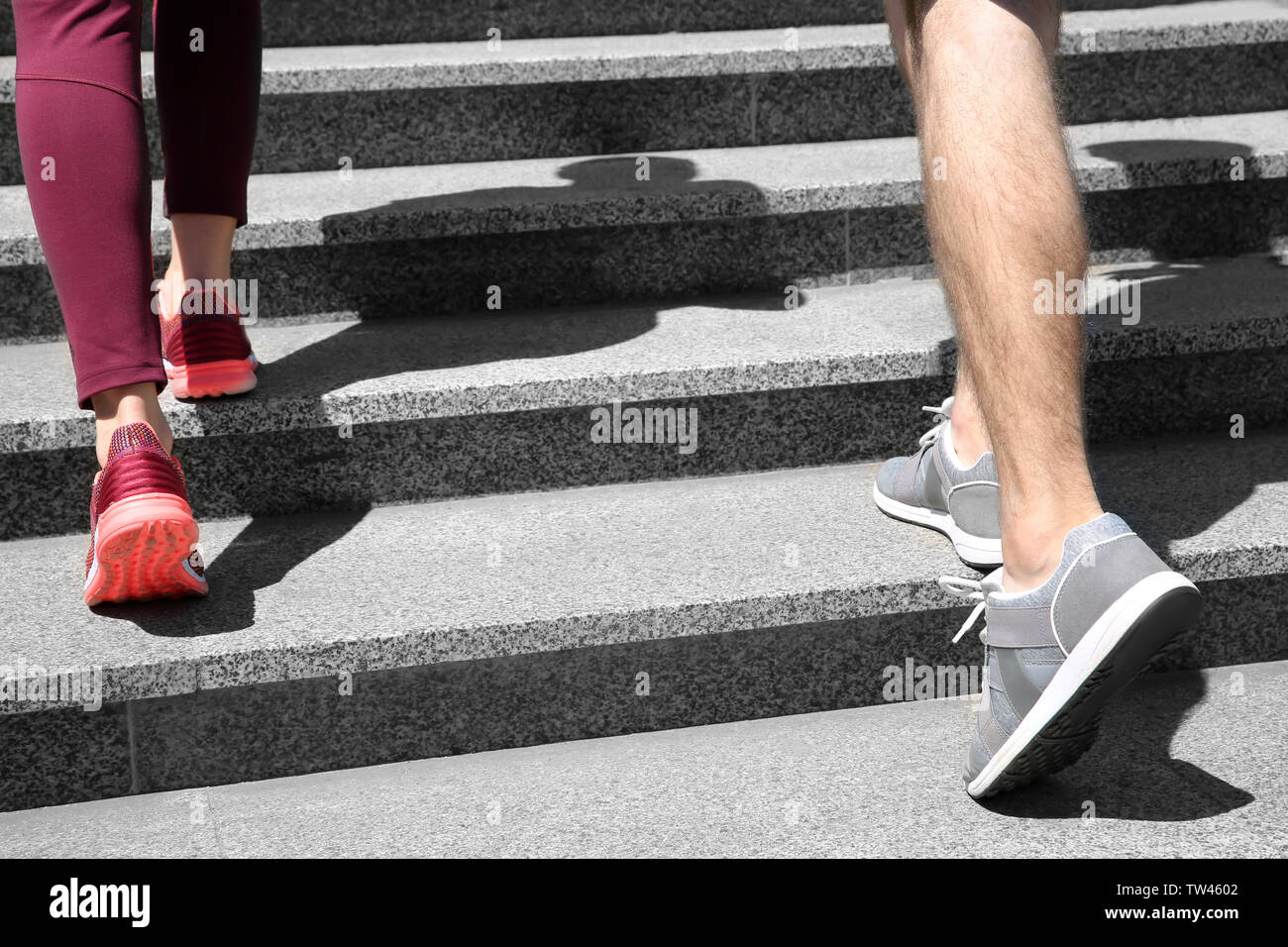 Couple running up stairs hi-res stock photography and images - Alamy