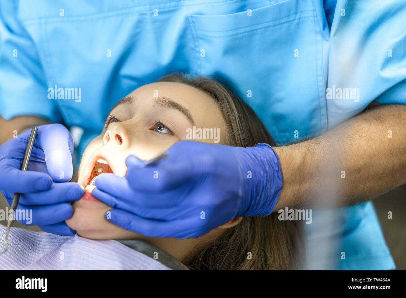Dental clinic. Reception, examination of the patient. Teeth care. Young