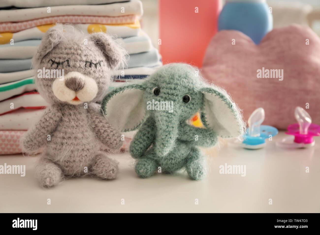 baby clothes stuffed animals