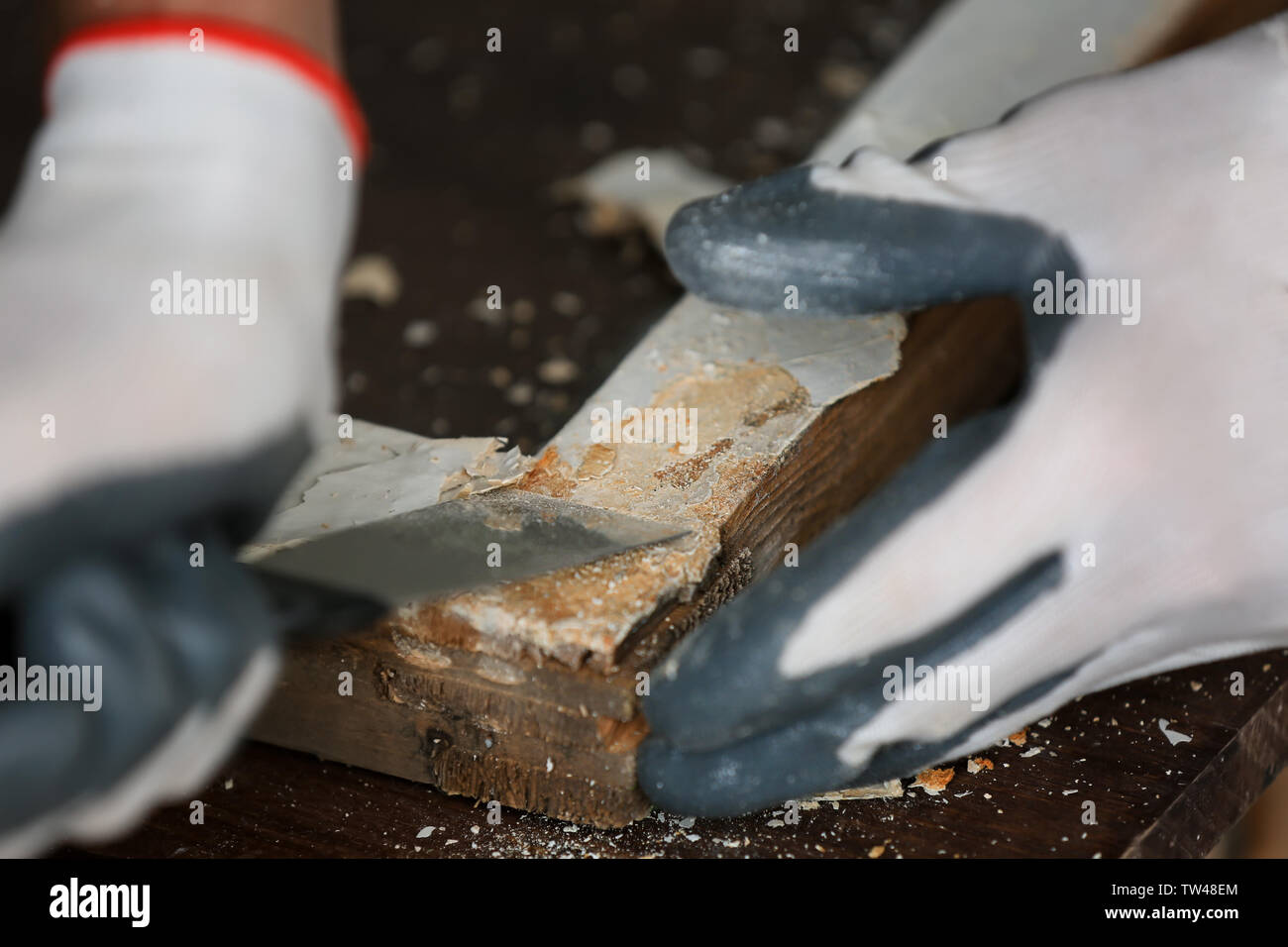Worker removing paint from old window frame, closeup Stock Photo Alamy