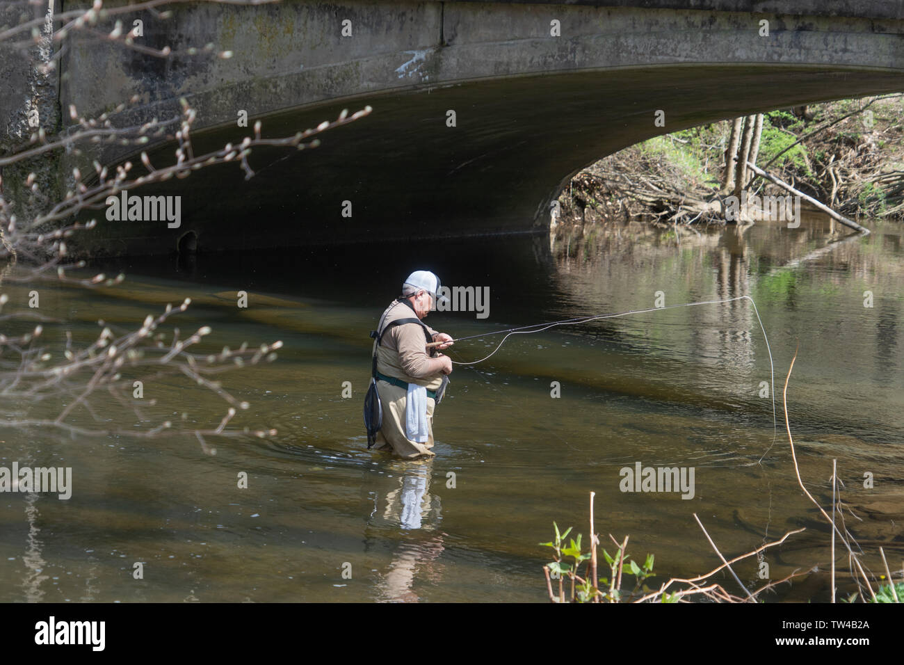 a man fly fishing at Ridley Creek State Park is a 2,606acre