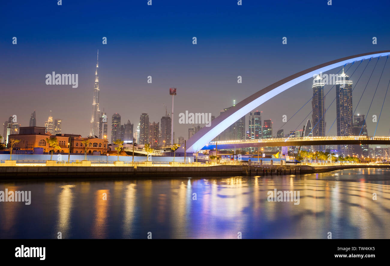 Dubai city skyline at night. view of Tolerance bridge Stock Photo - Alamy