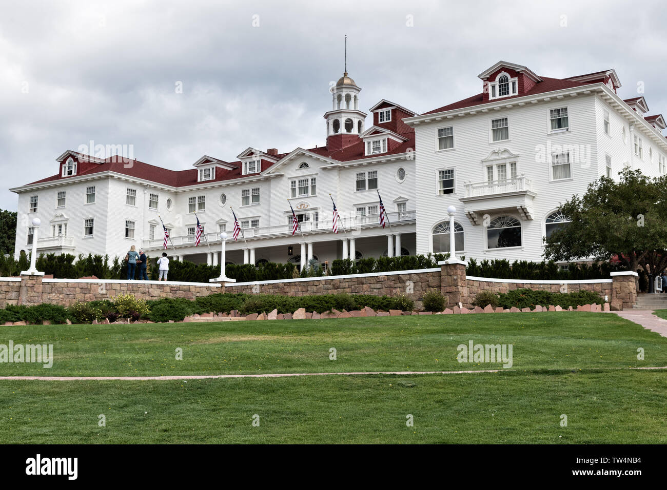The historic Stanley Hotel, a 142-room Colonial Revival hotel built in 1909, near the entrance to Rocky Mountain National Park in Estes Park, Colorado. The hotel served as the inspiration for the Overlook Hotel in the Stephen King bestselling novel The Shining. Stock Photo