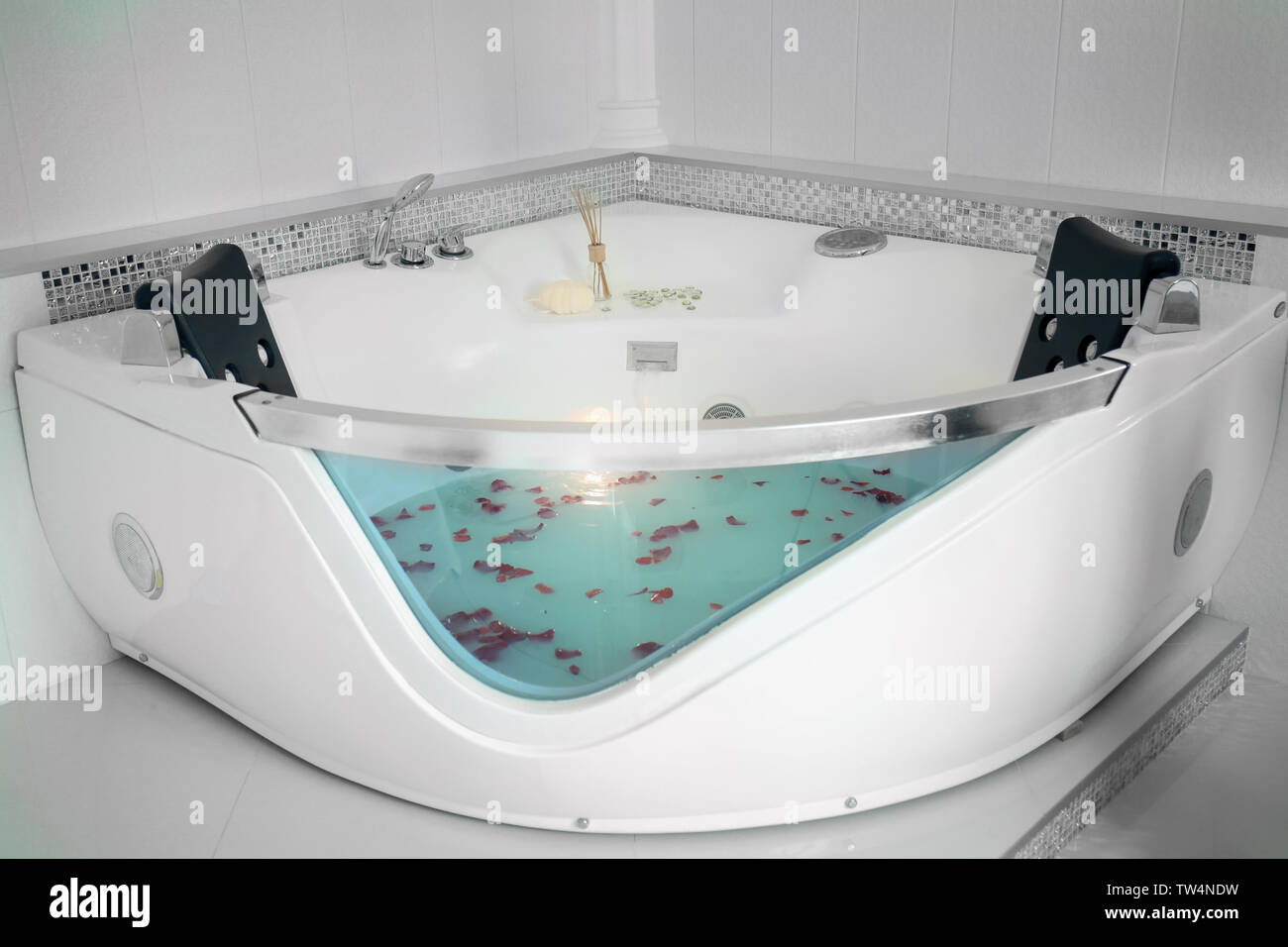 Jacuzzi bath in modern spa center Stock Photo Alamy