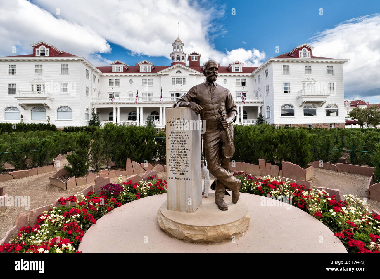 Statue of Freelan Oscar Stanley, inventor of the Stanley Steamer and the historic Stanley Hotel, a 142-room Colonial Revival hotel built in 1909, near the entrance to Rocky Mountain National Park in Estes Park, Colorado. The hotel served as the inspiration for the Overlook Hotel in the Stephen King bestselling novel The Shining. Stock Photo