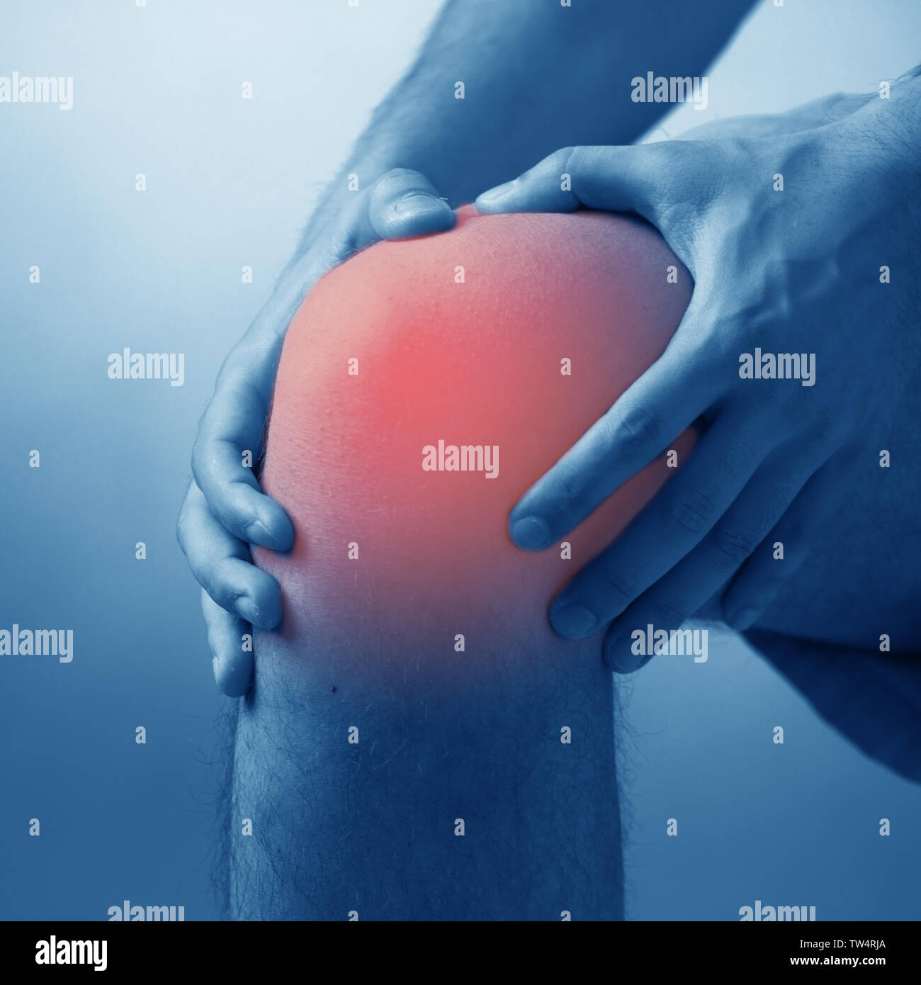 Man suffering from acute pain in knee Stock Photo Alamy