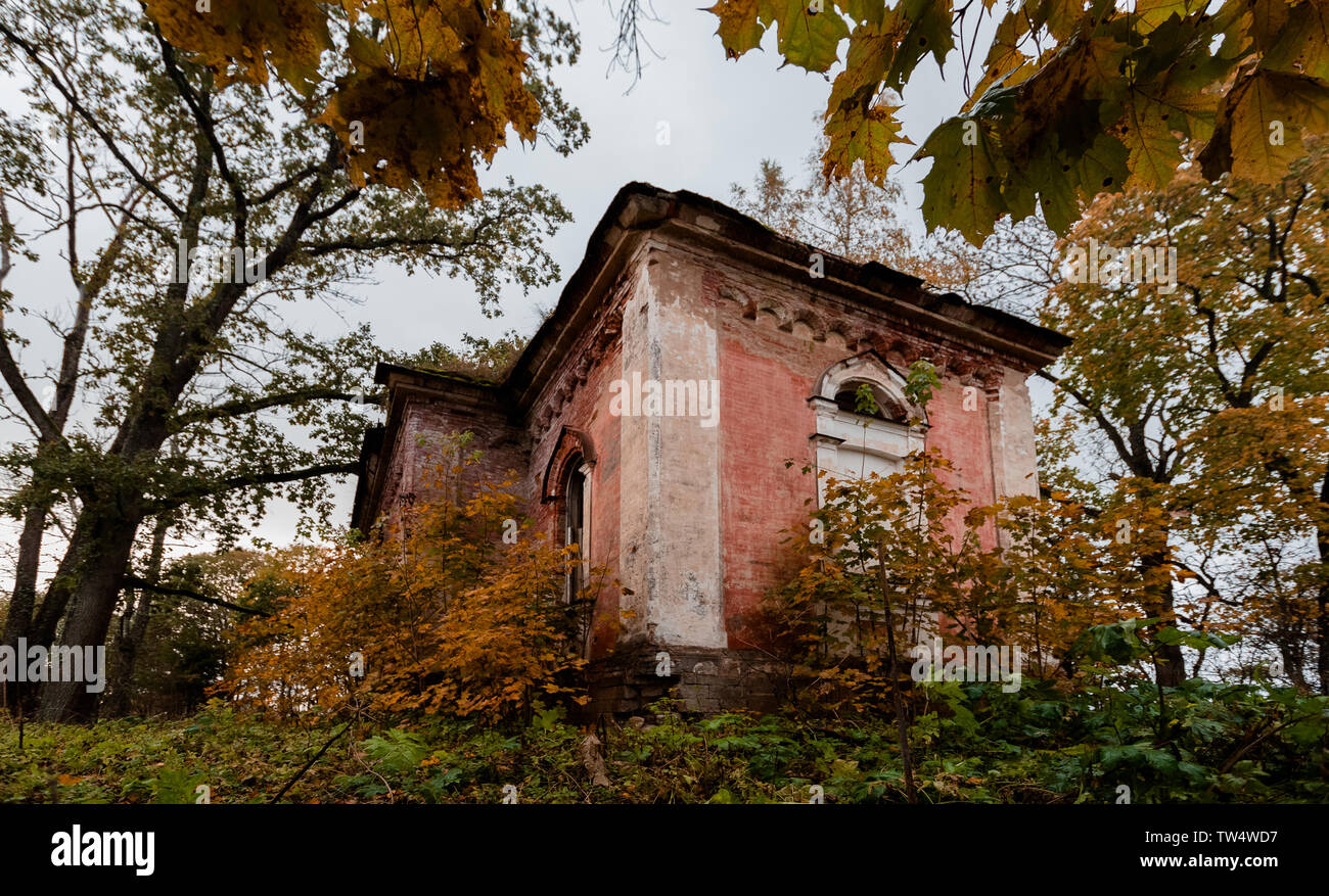 old destroyed building in autumn afternoon Stock Photo