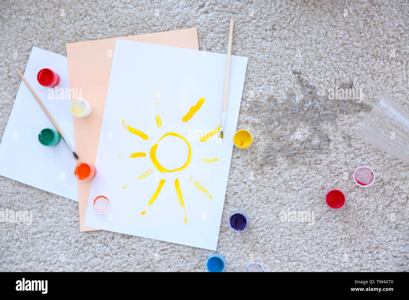 Picture, paints and spilled water on carpet Stock Photo Alamy