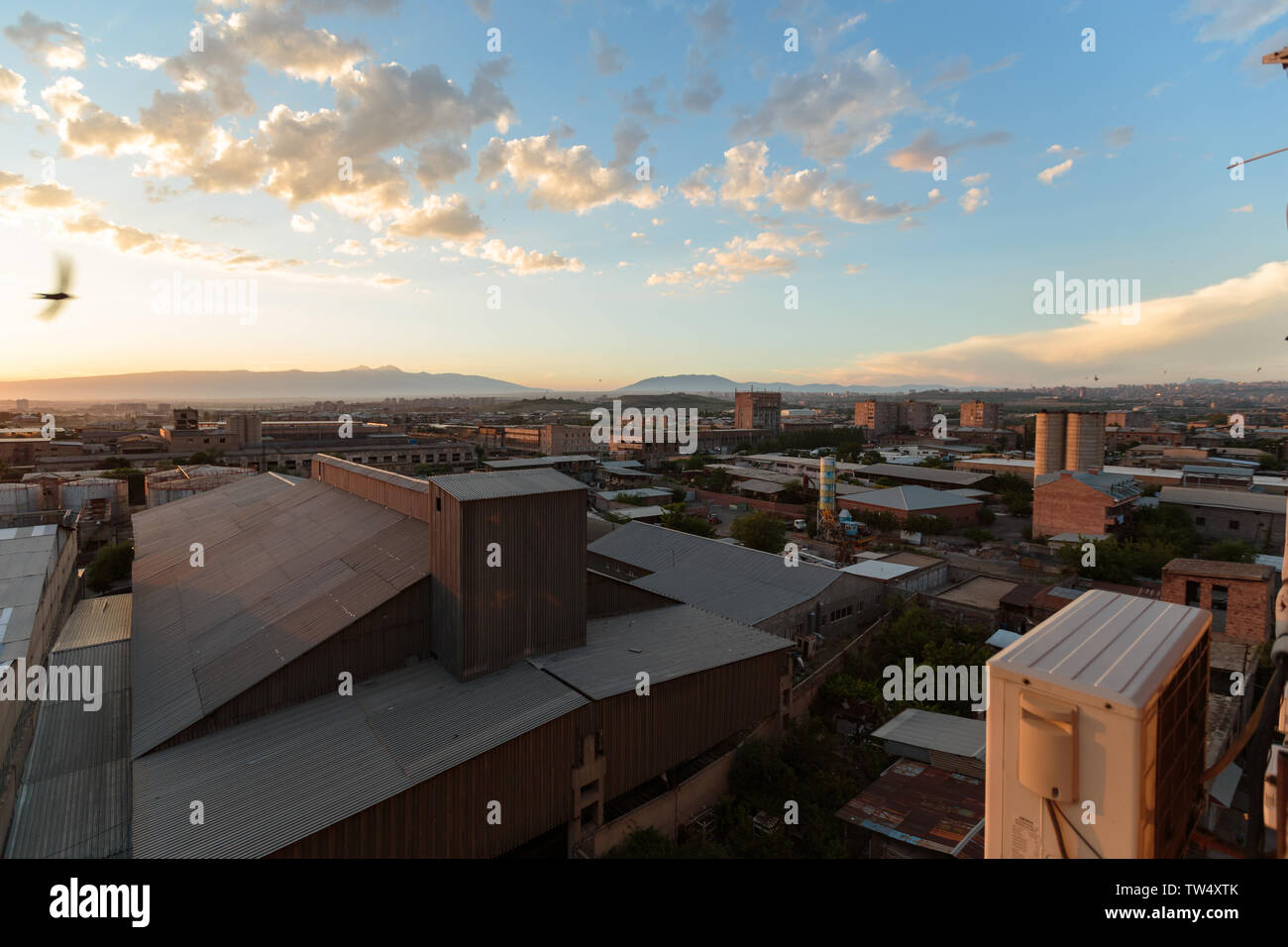 multi storey houses against the blue sky and white clouds view from ...
