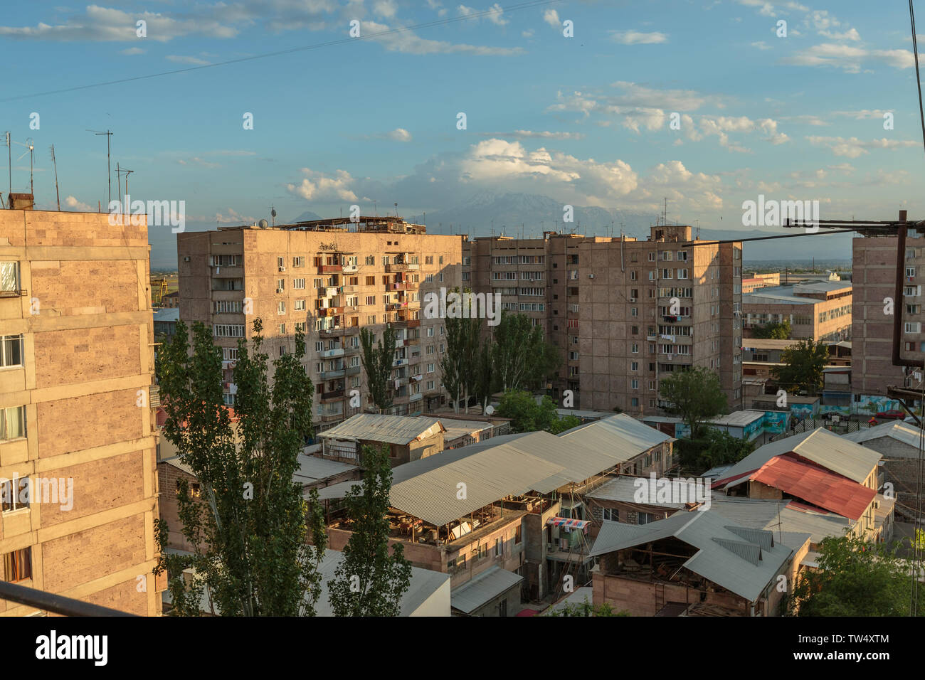 multi storey houses against the blue sky and white clouds Stock Photo ...
