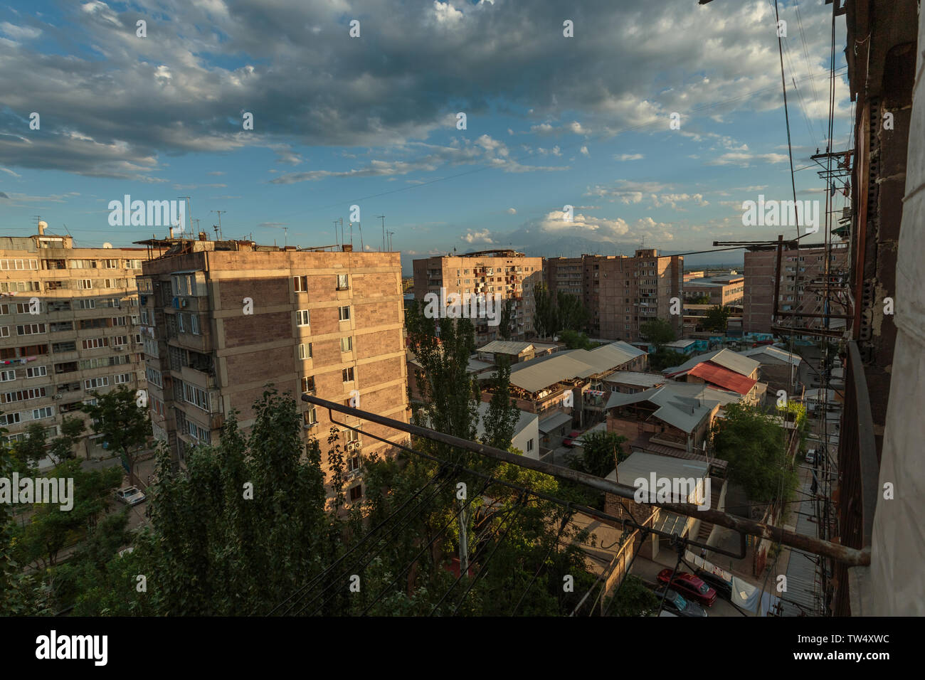 multi storey houses against the blue sky and white clouds Stock Photo ...
