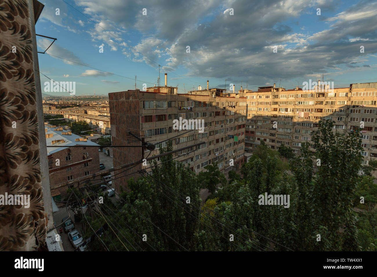 multi storey houses against the blue sky and white clouds Stock Photo ...