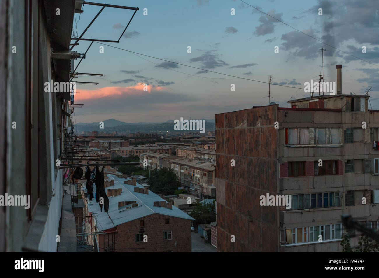 multi storey houses against the blue sky and white clouds Stock Photo ...